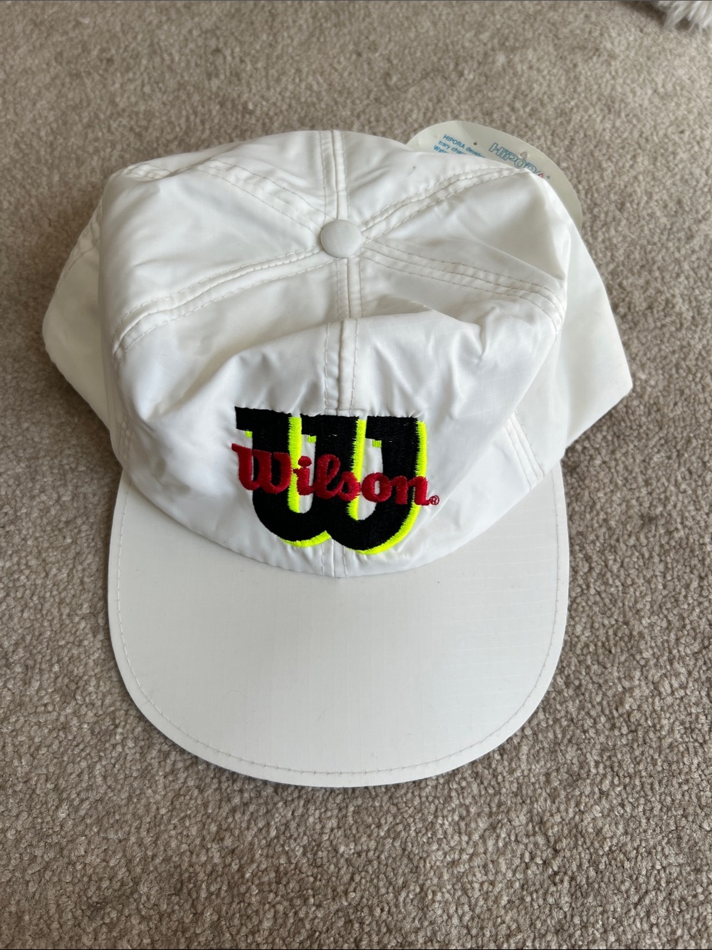 Wilson White Cap with Black, Red and Neon Yellow Logo